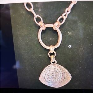 Silver necklace. Bought in local boutique. Never worn. Brand new.